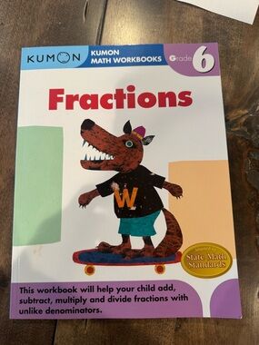 Kumon Grade 6 Fractions Workbook - White with Red Accent